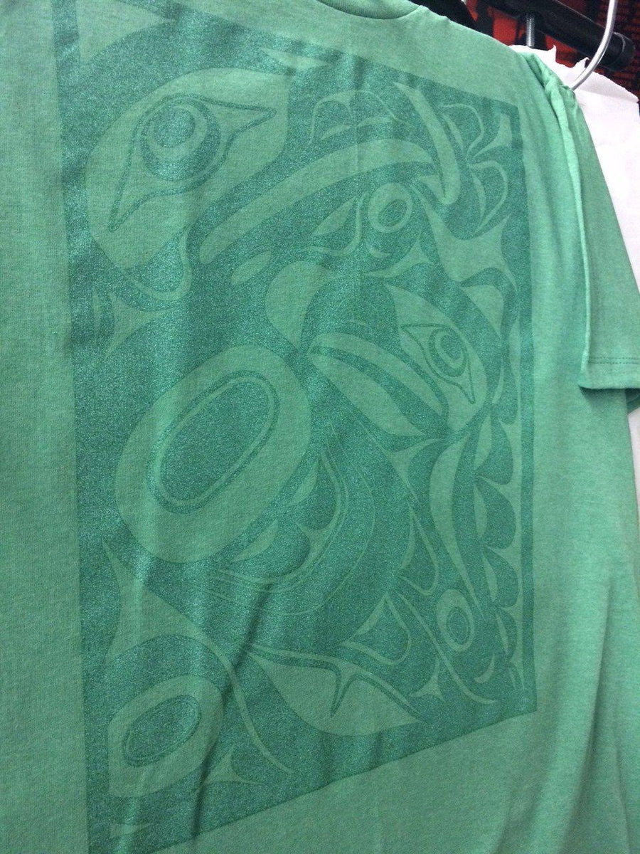 Close up of unisex t-shirt eagle motif by indigenous artist in green 2