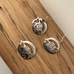 Close up of Baby earrings by indigenous artist sterling silver  2