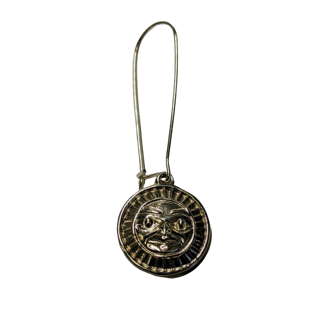 Close up of earrings silver moon or sun by indigenous artist 4