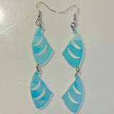 Close up up of puffin beak earrings by indigenous artist acrylic 5