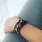 Close up of seal fur cuffs by indigenous artist