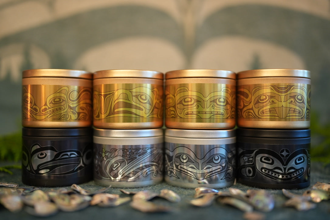 Illuminated Intentions candles with crest designs by Jesse Brillon