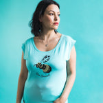Women's Bee Sacred cap sleeve top by indigenous artist Andy Everson in blue