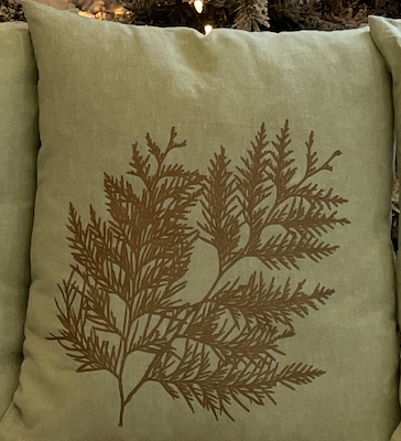 Close up of holiday pillow by indigenous artist home decor cream 3