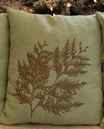 Close up of holiday pillow by indigenous artist home decor cream 3