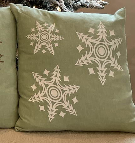 Close up of holiday pillow by indigenous artist home decor cream 4