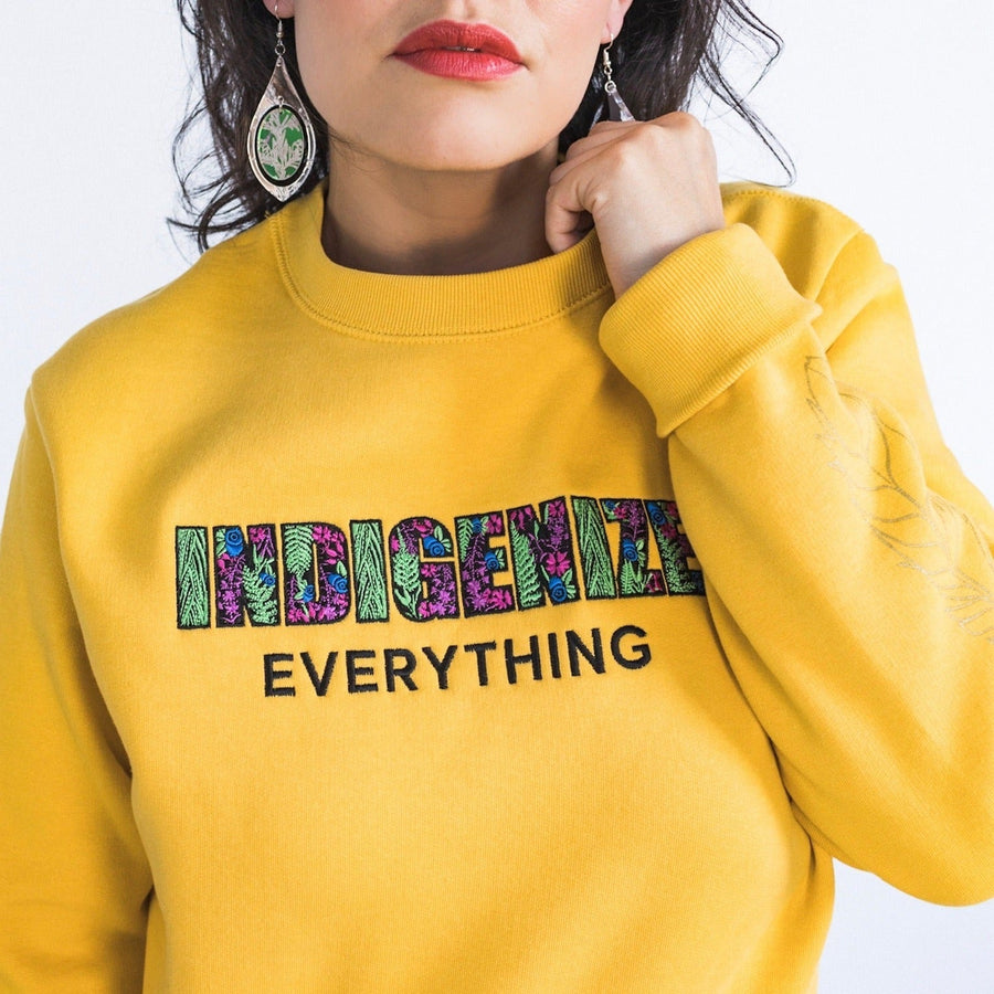 Model wearing Indigenize everything top in yellow by indigenous artist