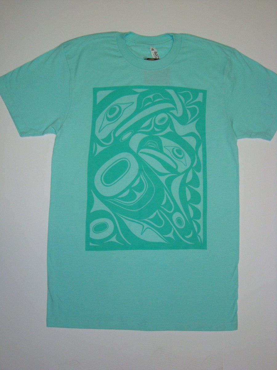 Close up of unisex t-shirt eagle motif by indigenous artist in green