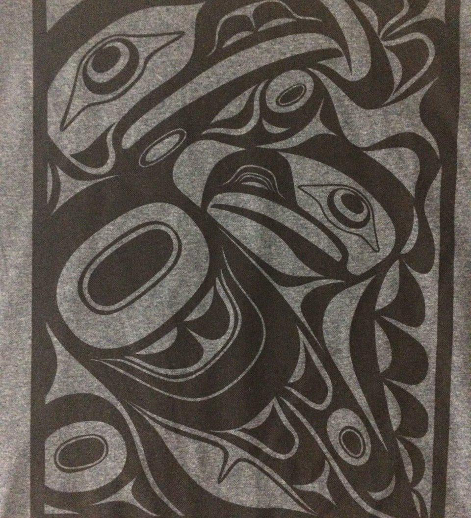 Close up of unisex t-shirt eagle motif by indigenous artist in grey