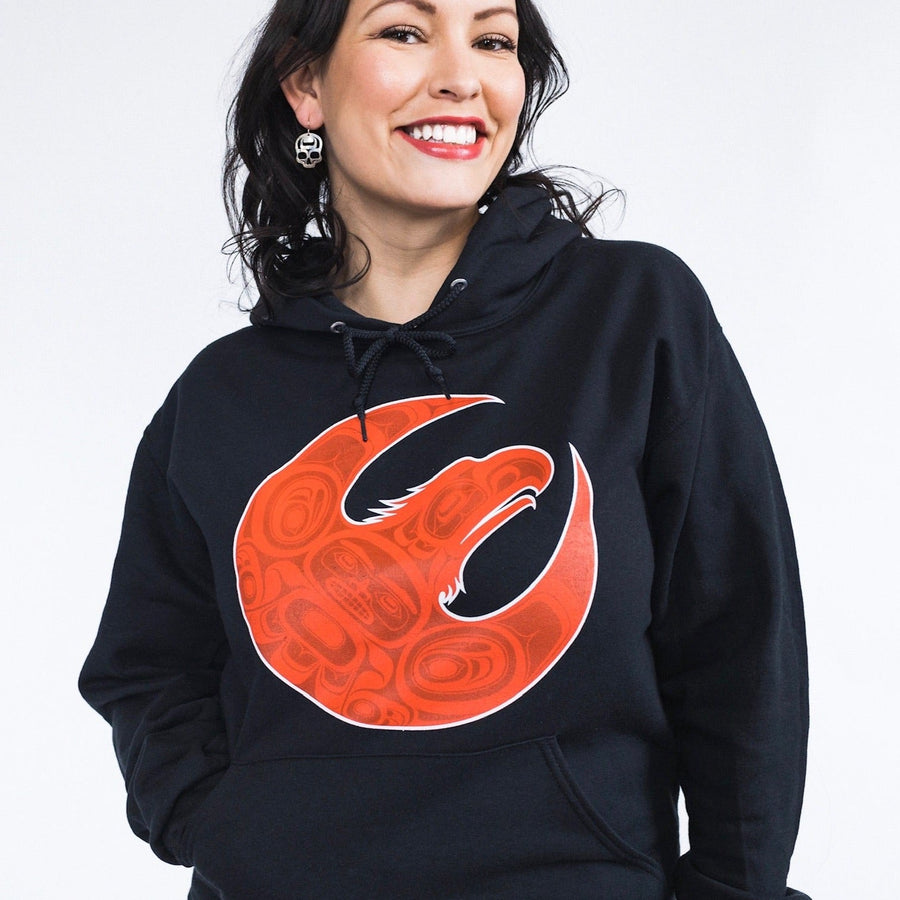 Model wearing unisex hoodie called Hope by indigenous artist