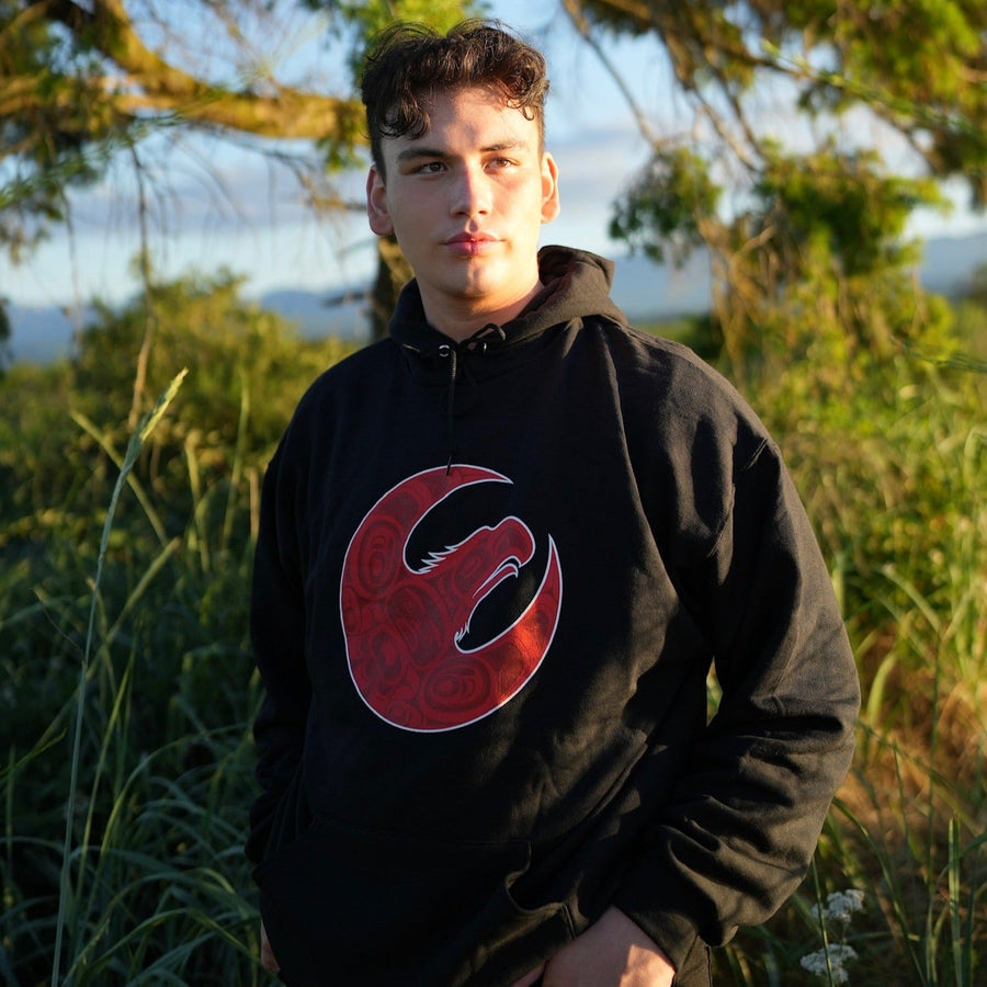Model outside wearing unisex hoodie called Hope by indigenous artist