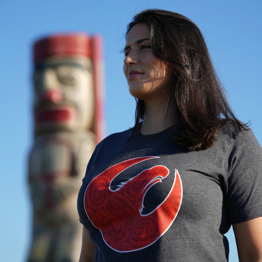 Model outside wearing unisex hoodie called Hope by indigenous artist