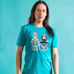 Model wearing unisex t-shirt called indige fig by indigenous artist in green