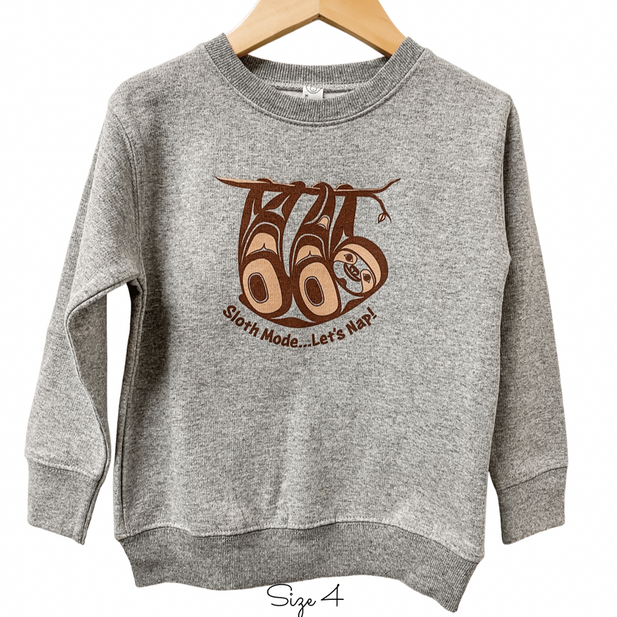 Front view of Native apparel kids sweatshirt featuring the sloth by Indigenous artist 2