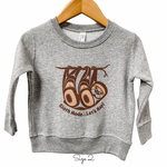 Front view of Native apparel kids sweatshirt featuring the sloth by Indigenous artist 4