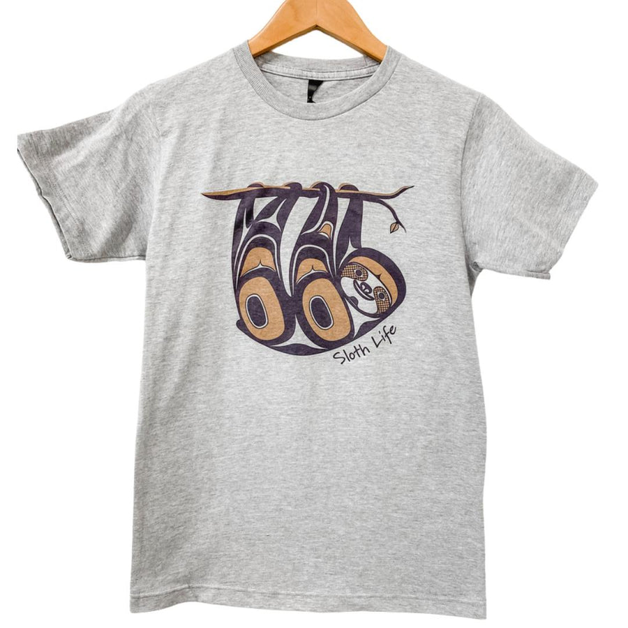 Front view of unisex t-shirt featuring a sloth by indigenous artist in white