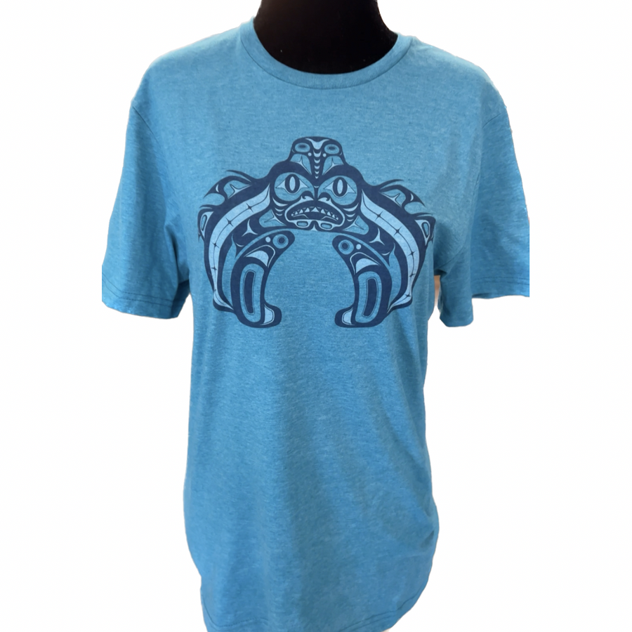 Front view of Native apparel Dog Fish Crest unisex t-shirt by Indigenous artist in blue