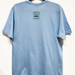 Back view of Native apparel called The Return unisex t-shirt by Indigenous artist