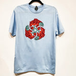 Front view of Native apparel called The Return unisex t-shirt by Indigenous artist