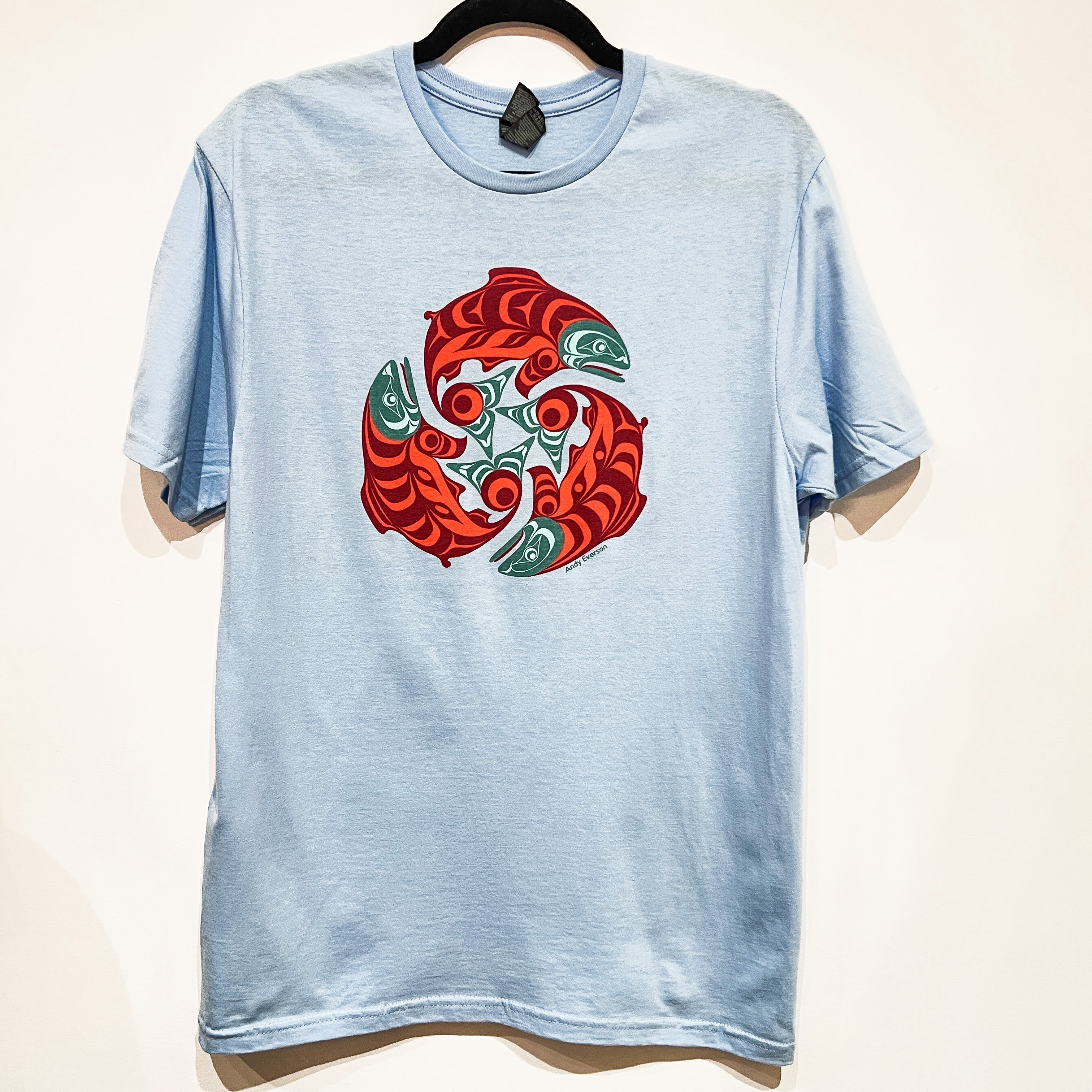Front view of Native apparel called The Return unisex t-shirt by Indigenous artist