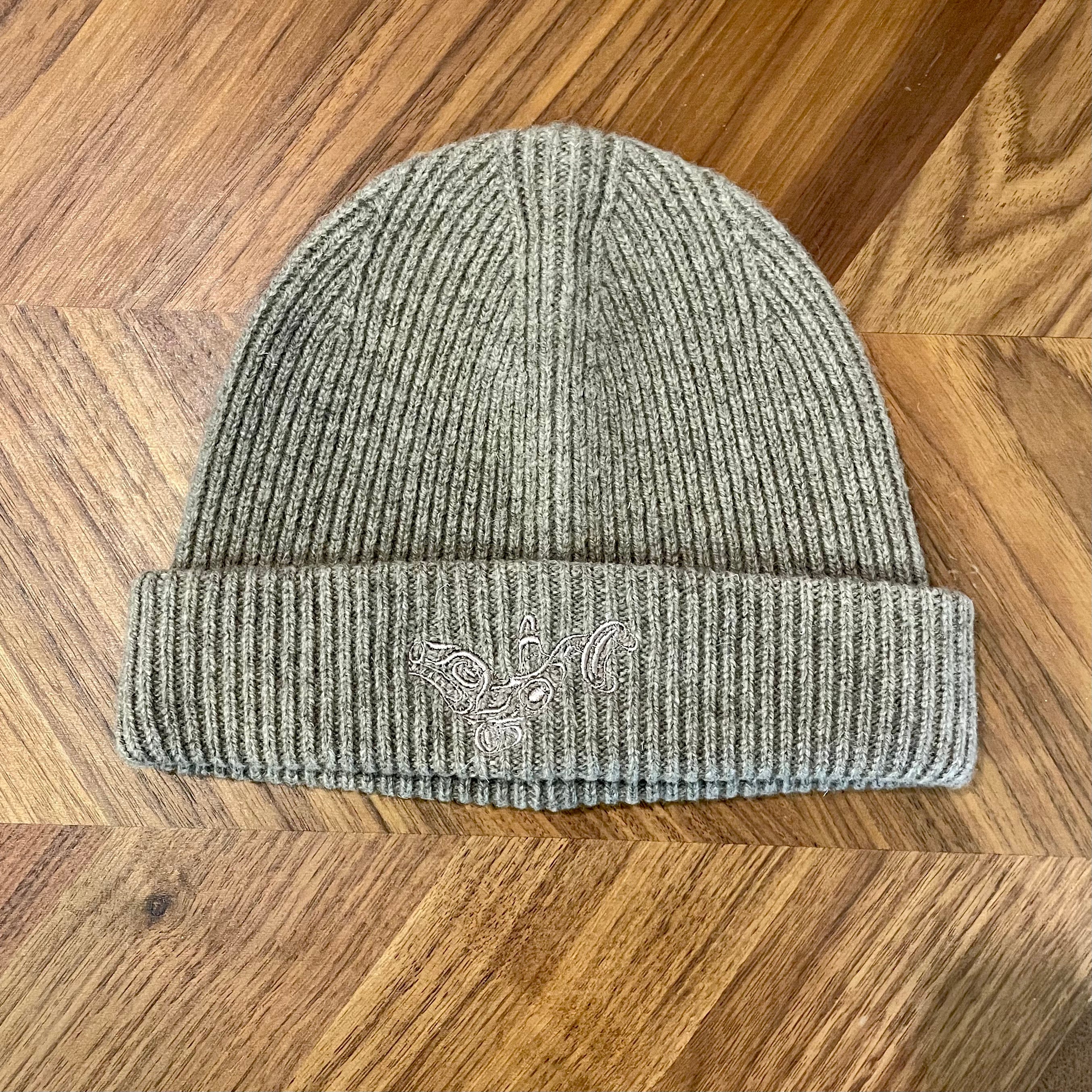 Beige wool winter hat with embroidered Killer Whale design by Haida artist Jesse Brillon