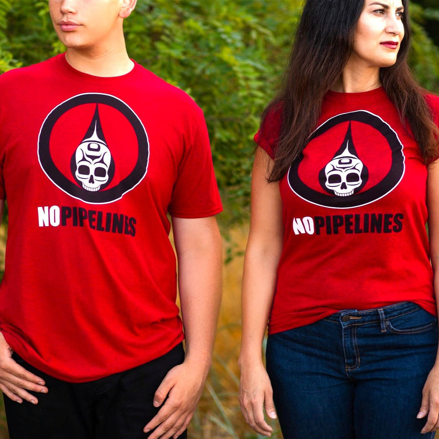 Two models wearing Unisex t-shirt called No Pipelines by indigenous artist Andy Everson