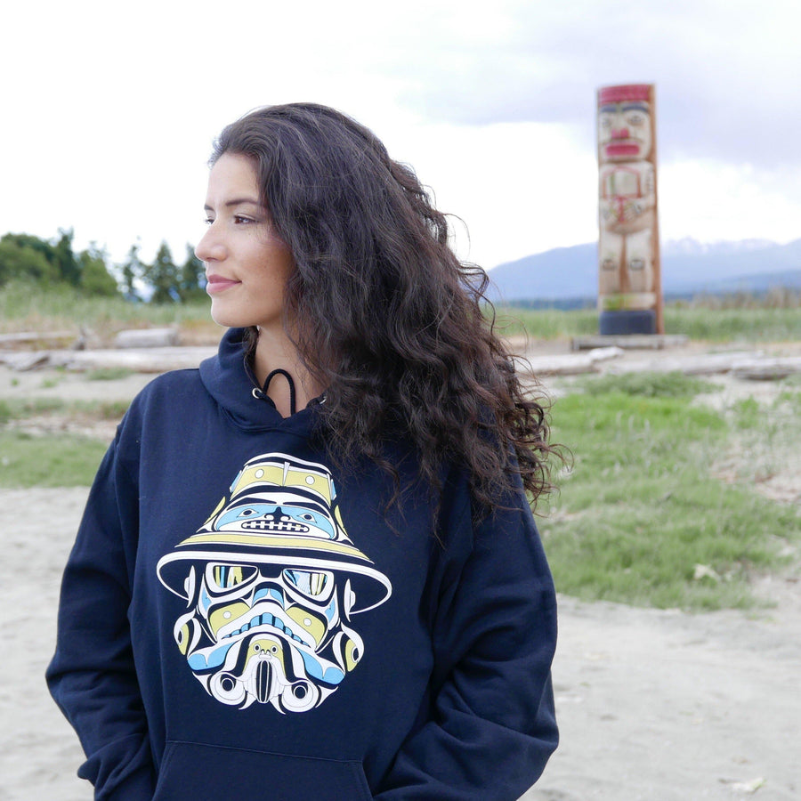 Model wearing apparel hoodie called Idle No More by indigenous artist Andy Everson