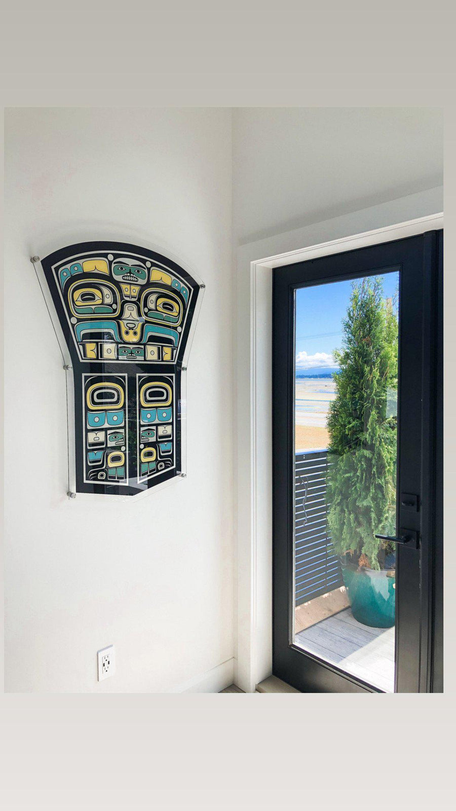 Native fine art print on wall called Prosperity by indigenous artist Andy Everson