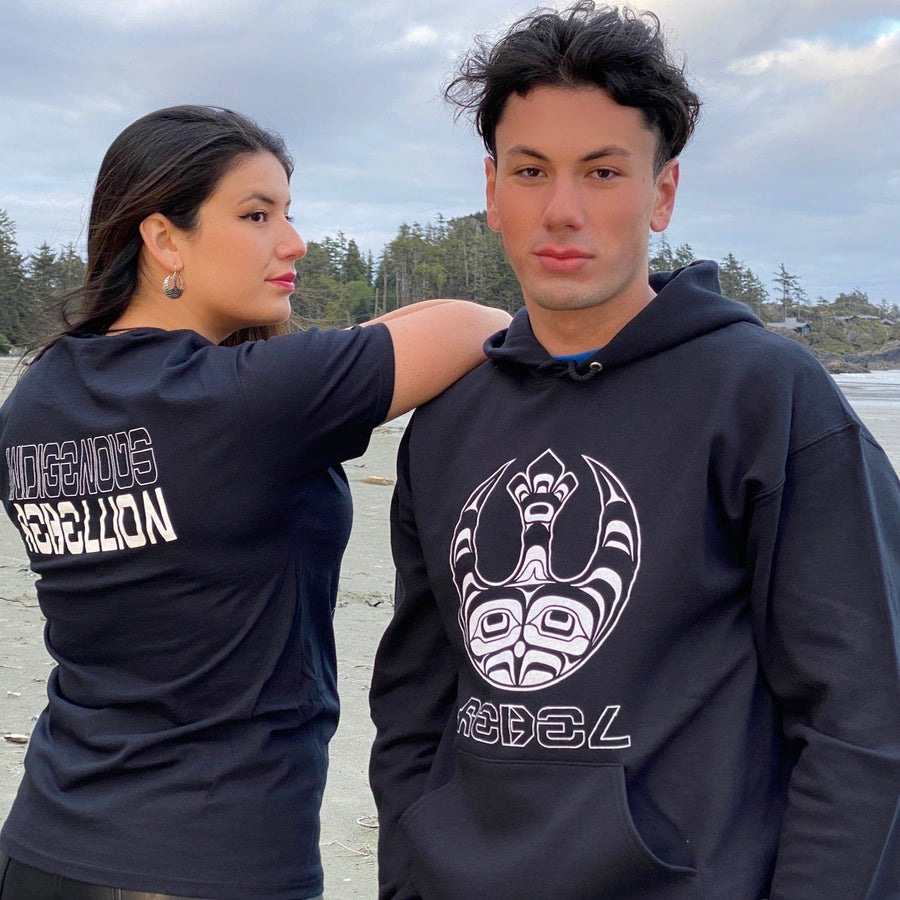 Two Models wearing Indigenous Rebellion Hoodie Unisex by indigenous artist Andy Everson