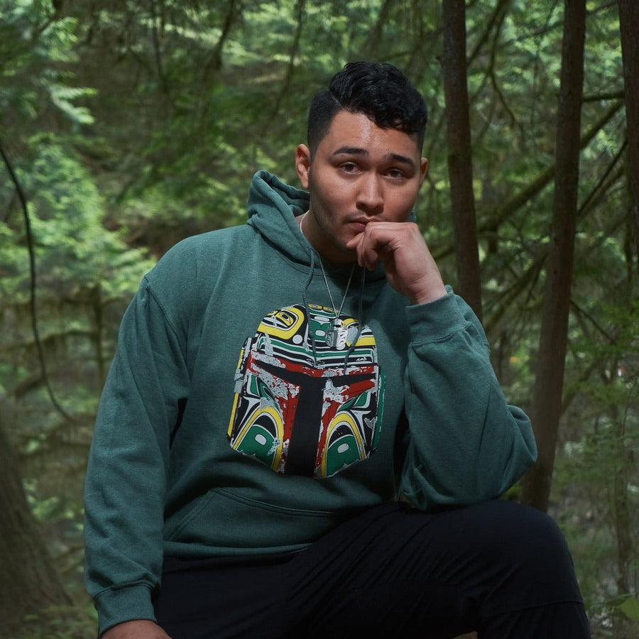 Model wearing unisex hoodie called Resilience by indigenous artist