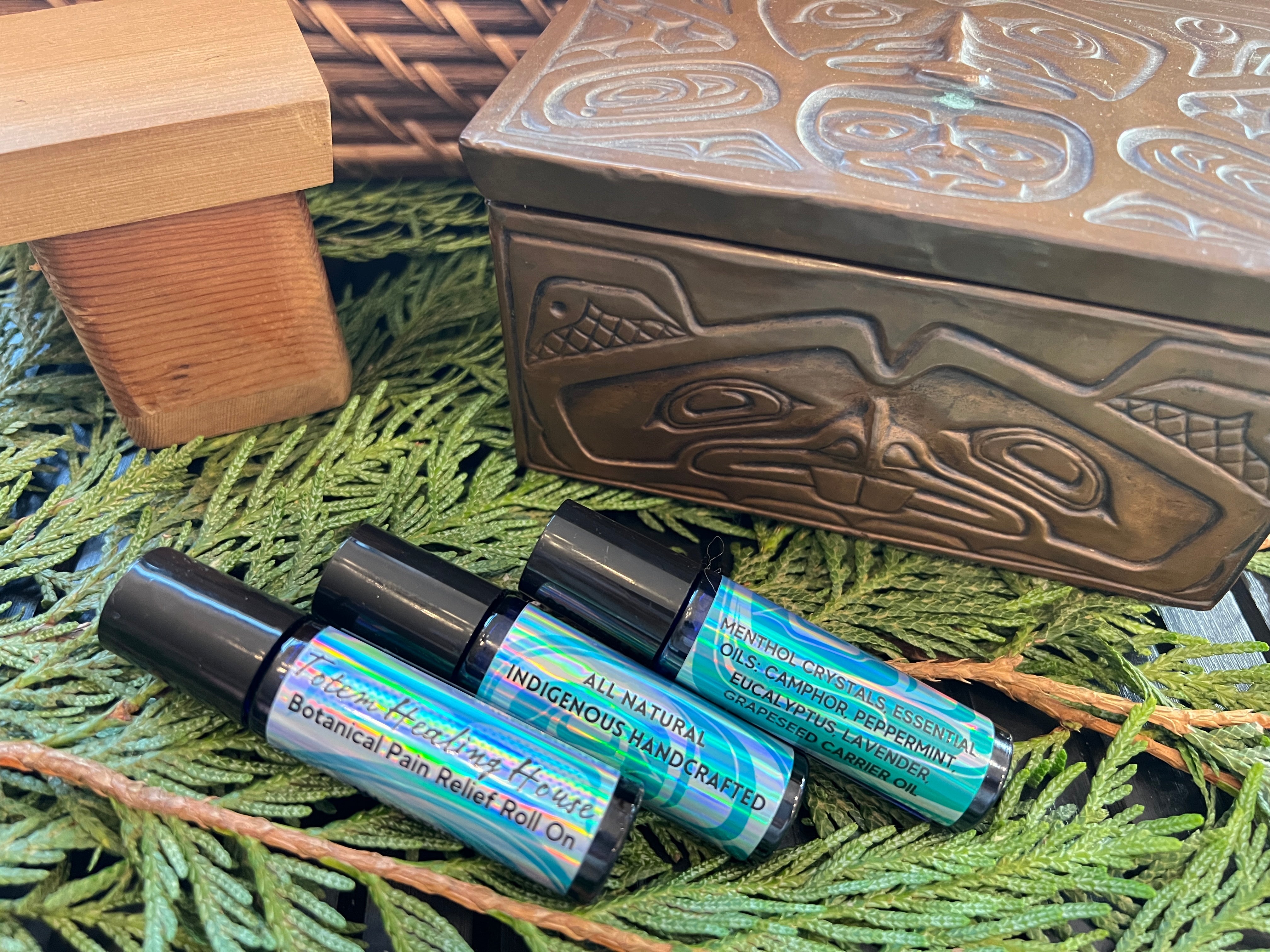 Close up of botanical pain relief roll on by indigenous artist