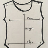 Model wearing cap-sleeve bamboo top by indigenous artist featuring a bear size guide