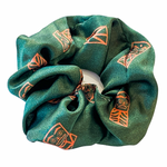 womens scrunchies created by indigenous artist in multi colored green