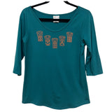 Front view of womens top created by indigenous artist called coppers