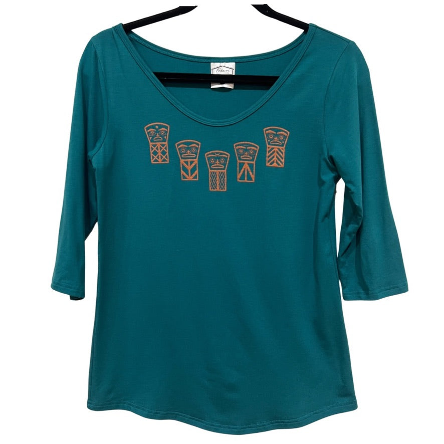 Front view of womens top created by indigenous artist called coppers