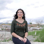 Model outside wearing womens organic cotton top by indigenous artist called coppers