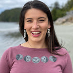 Model wearing womens top created by indigenous artist called moon phase