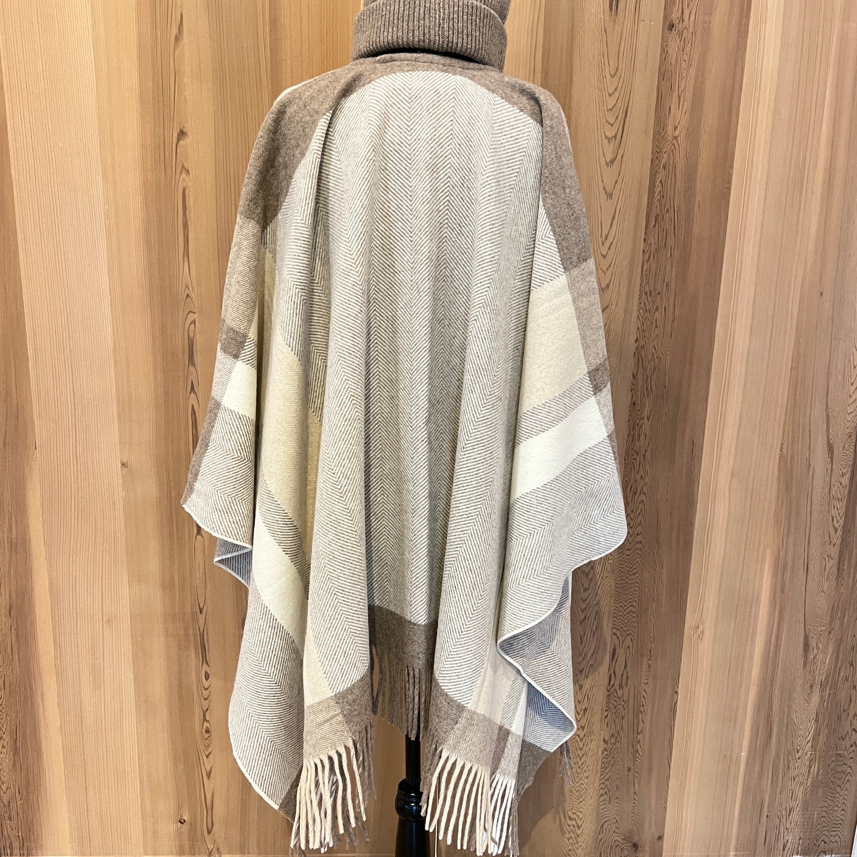 Womens wool wrap created by indigenous artist on mannequin 3