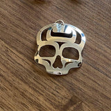 Close up of ancestral skull pendant by indigenous artist sterling silver 2