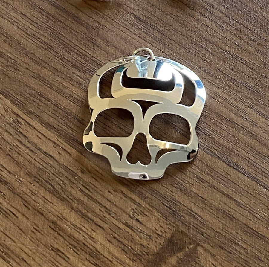 Close up of ancestral skull pendant by indigenous artist sterling silver 2