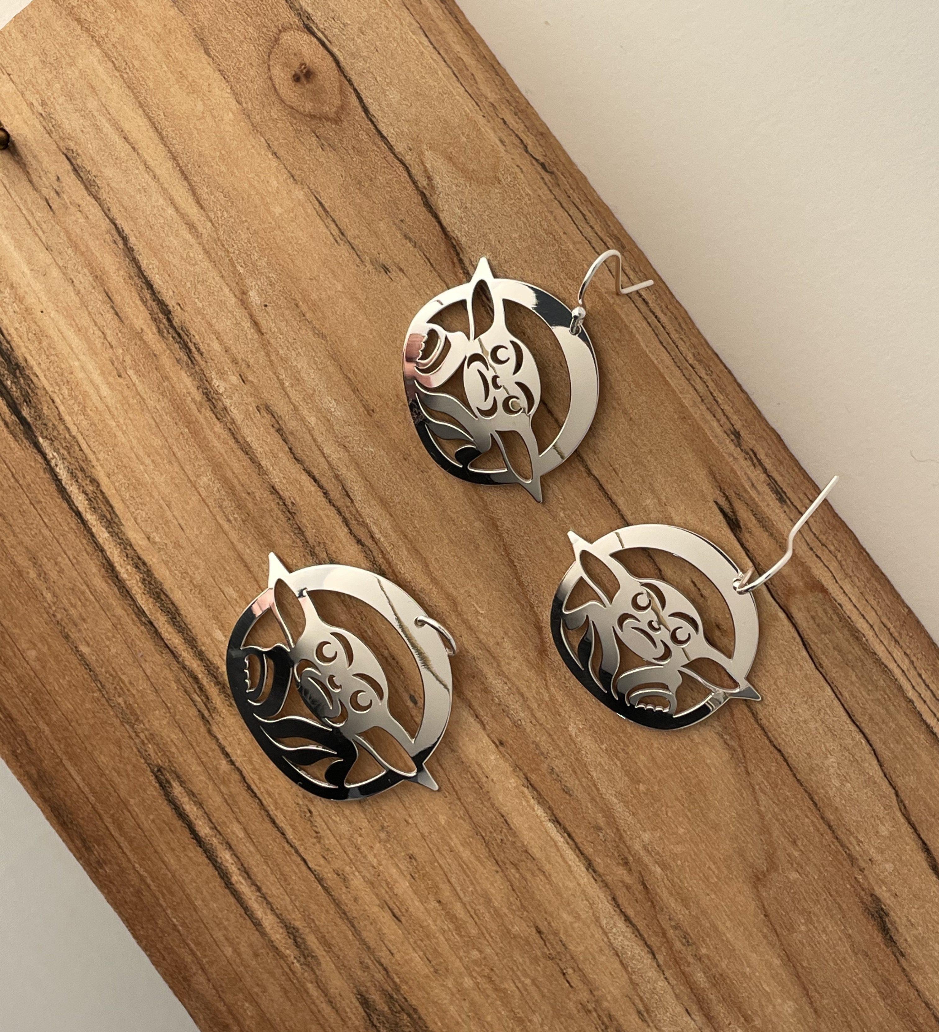 Close up of Baby earrings by indigenous artist sterling silver  2