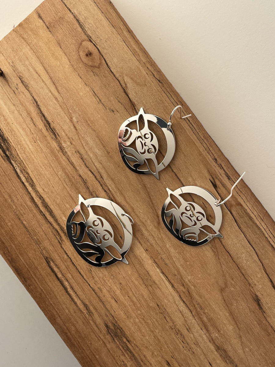 Close up of Baby earrings by indigenous artist sterling silver  2