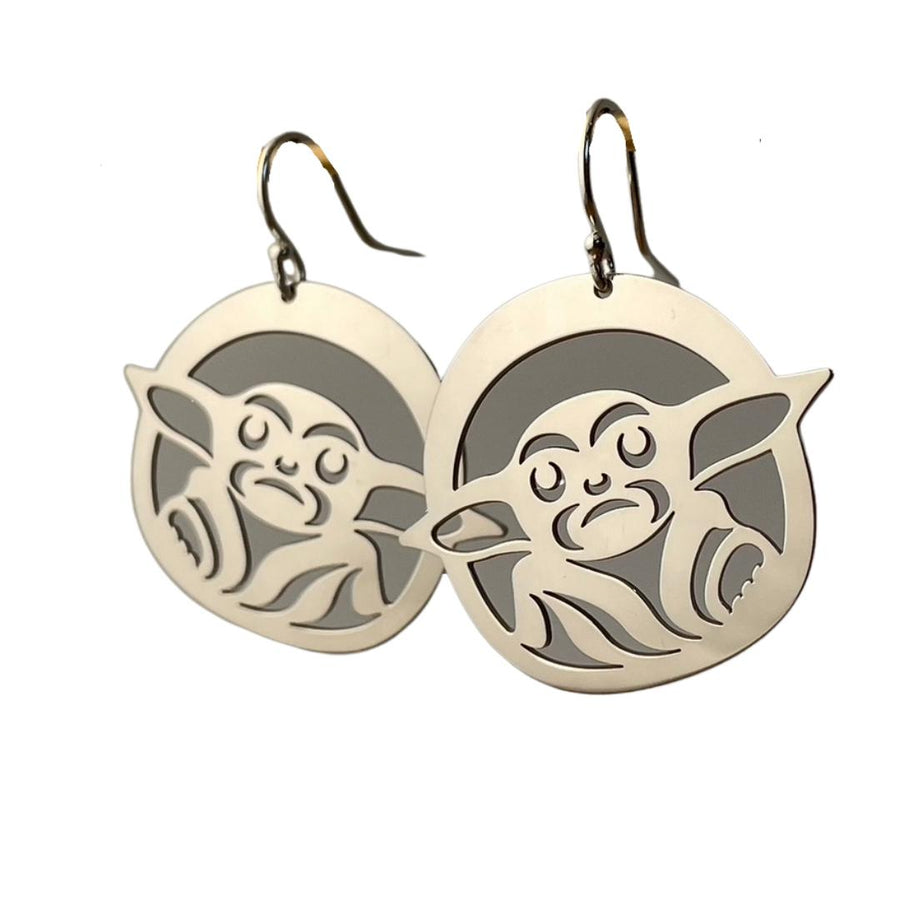 Close up of Baby earrings by indigenous artist sterling silver