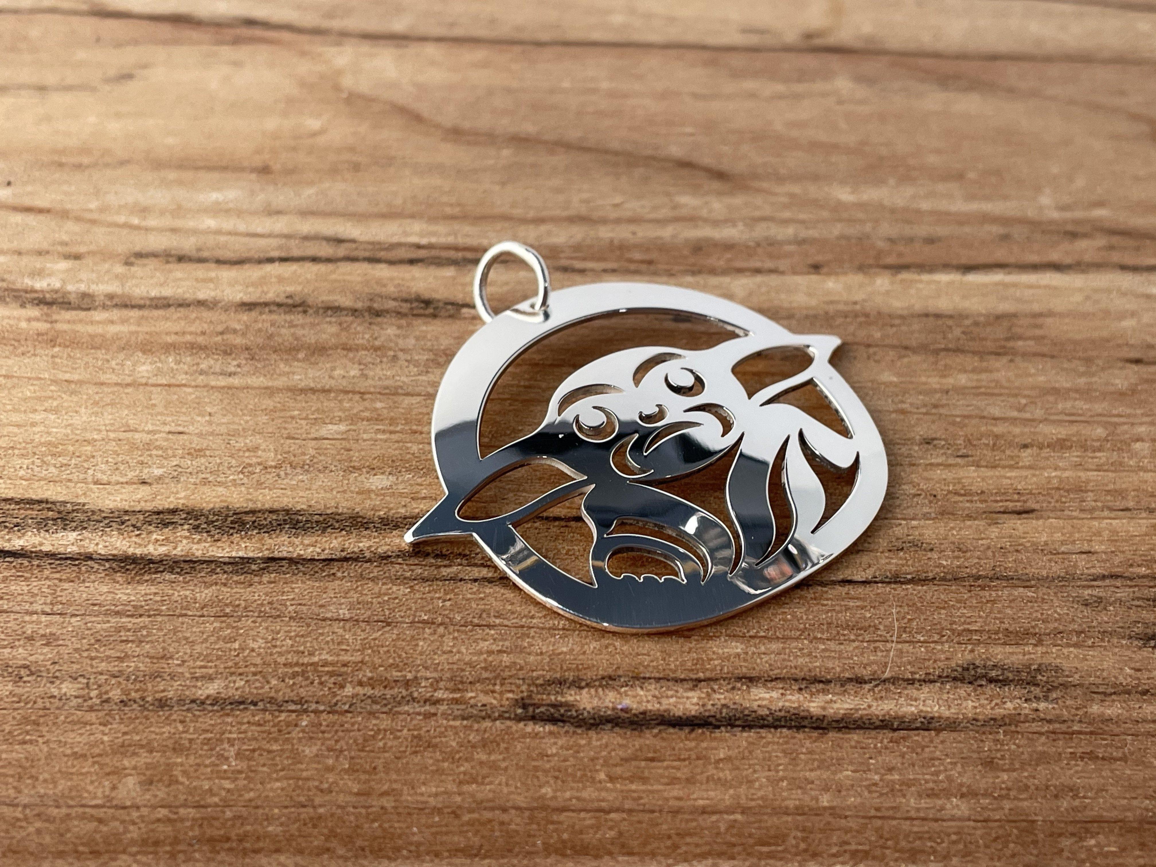 Close up of Baby pendant by indigenous artist sterling silver 3