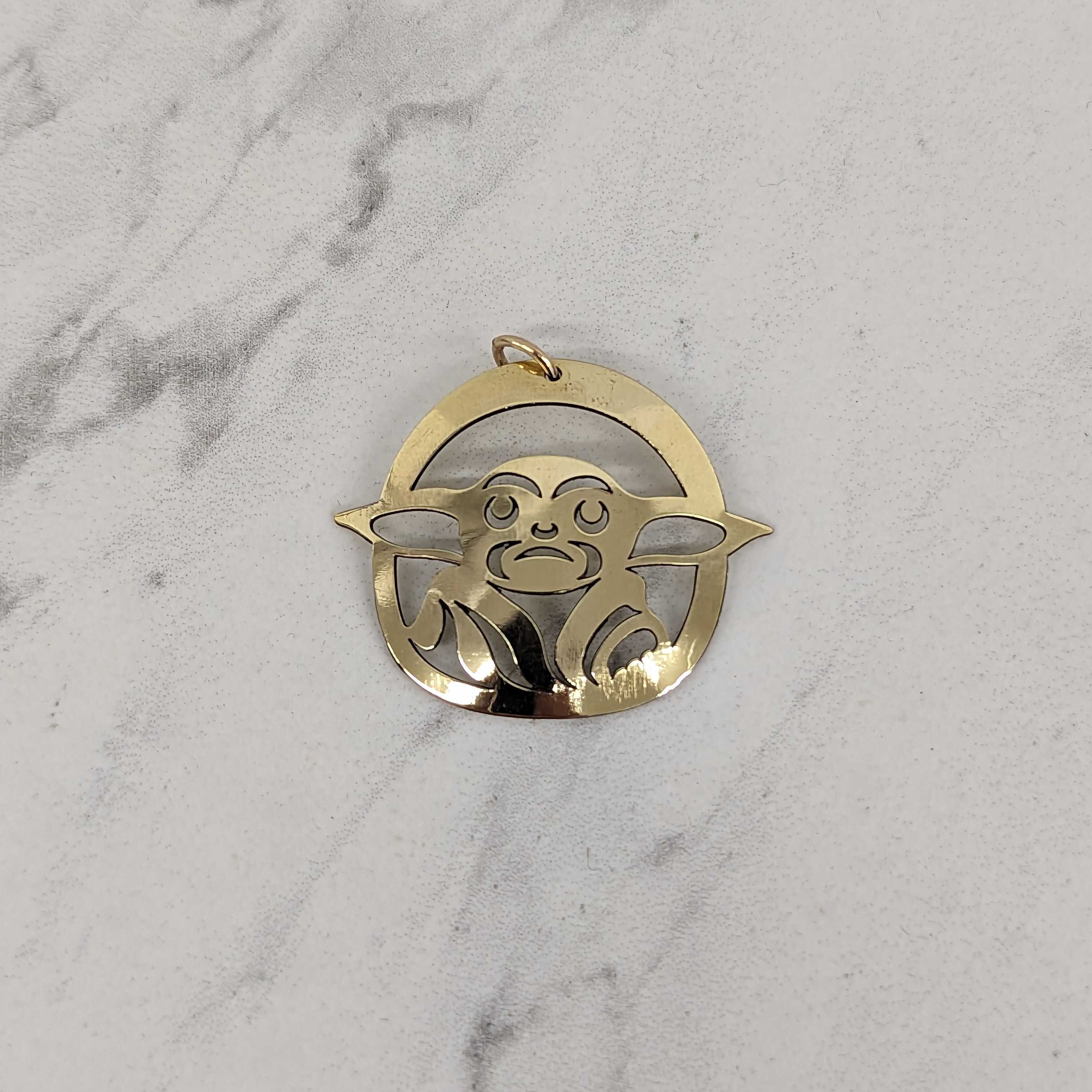 Close up of Baby pendant by indigenous artist sterling silver 4