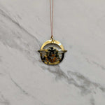 Close up of Baby pendant by indigenous artist sterling silver 5
