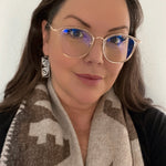 Model wearing butterfly earrings by indigenous artist silver 2