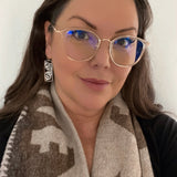 Model wearing butterfly earrings by indigenous artist silver 2
