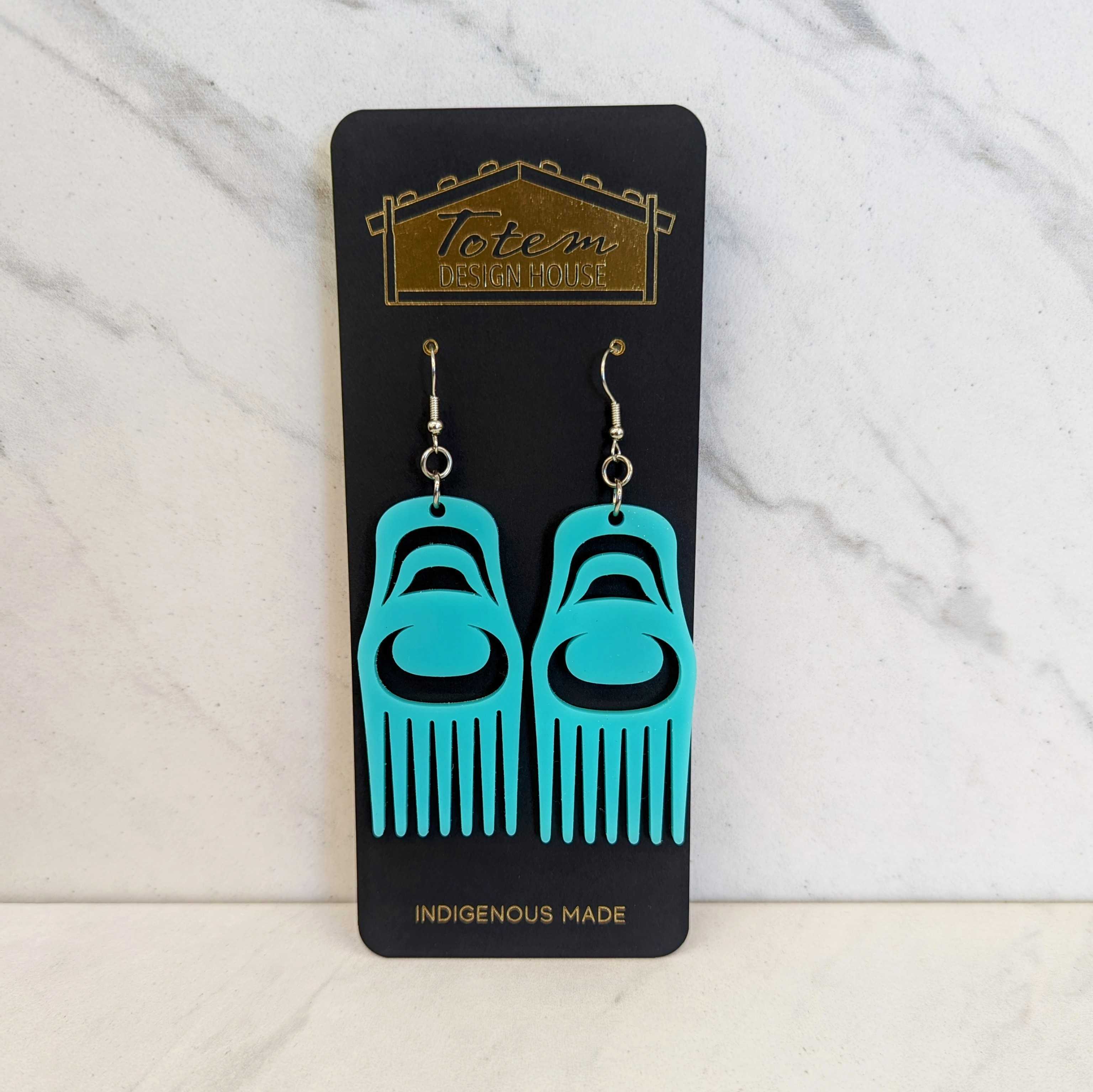 Close up up of comb earrings by indigenous artist acrylic 4