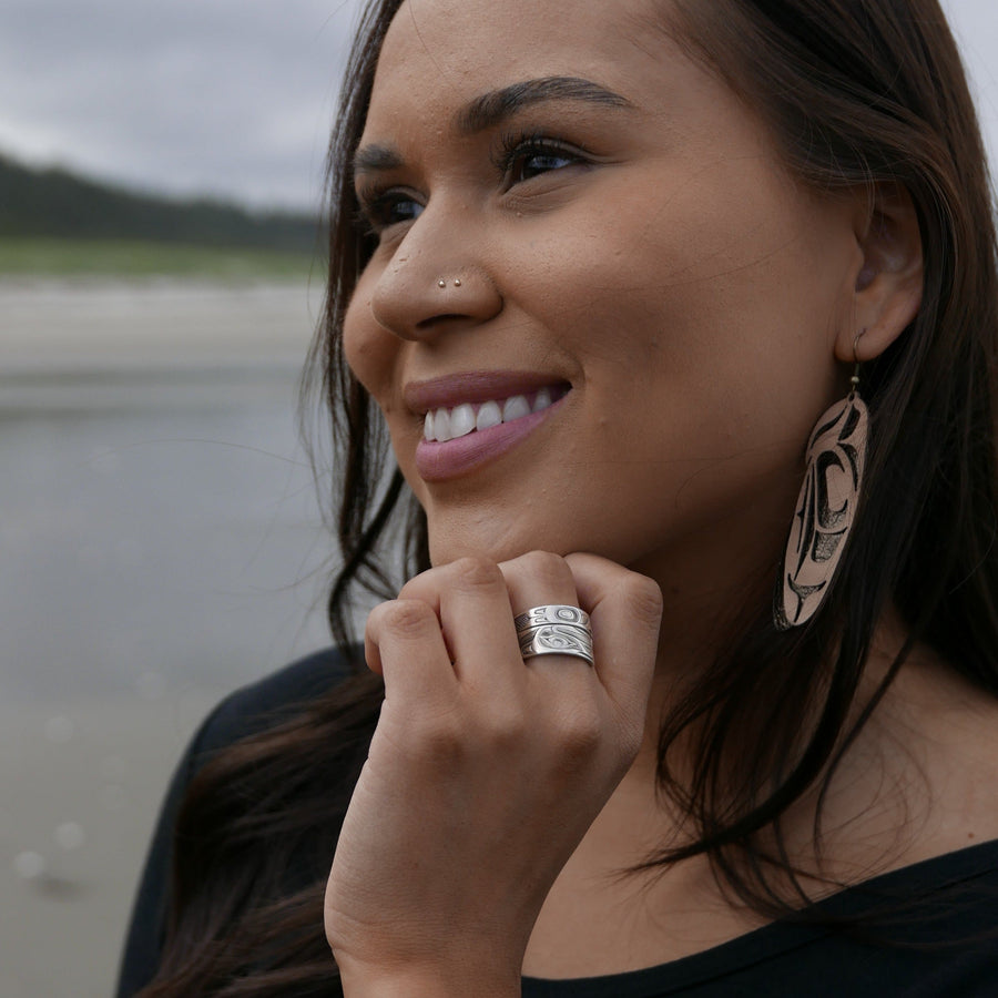 Close up of eagle wrap ring by indigenous artist silver